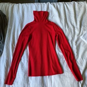 Women’s red turtleneck